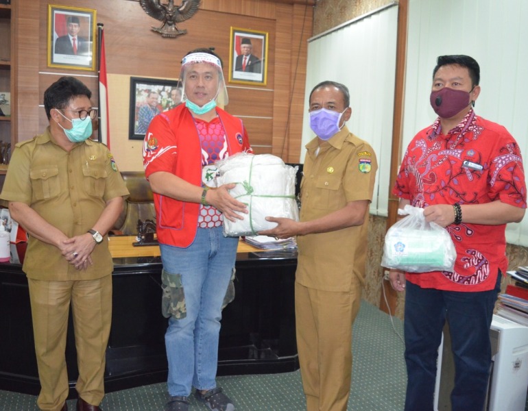 Lagi, PSMTI Sulteng Bantu APD ke Pemkot Palu